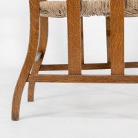 Liberty & Co., An Arts & Crafts Rush Seat Armchair with a Shaped Back - Thumbnail 17