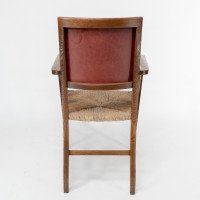 Liberty & Co., An Arts & Crafts Rush Seat Armchair with a Shaped Back - Thumbnail 19
