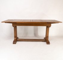 Heals & Son. An Arts & Crafts Narrow Oak Extending Dining Table - Thumbnail 6