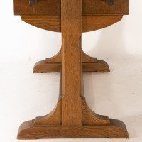 Heals & Son. An Arts & Crafts Narrow Oak Extending Dining Table - Thumbnail 11