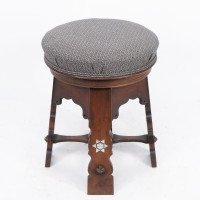 Liberty & Co., attributed. A Rare Moorish Walnut Revolving Stool with Moorish Arches - Thumbnail 8
