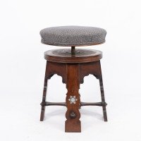 Liberty & Co., attributed. A Rare Moorish Walnut Revolving Stool with Moorish Arches - Thumbnail 10