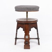 Liberty & Co., attributed. A Rare Moorish Walnut Revolving Stool with Moorish Arches - Thumbnail 9