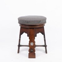 Liberty & Co., attributed. A Rare Moorish Walnut Revolving Stool with Moorish Arches - Thumbnail 11