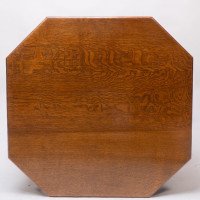 Ambrose Heals attri. An Arts & Crafts oak octagonal book table with eight legs - Thumbnail 11
