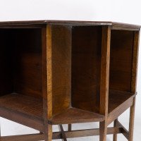 Ambrose Heals attri. An Arts & Crafts oak octagonal book table with eight legs - Thumbnail 13