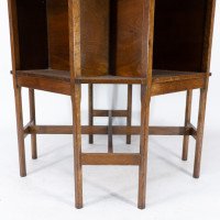 Ambrose Heals attri. An Arts & Crafts oak octagonal book table with eight legs - Thumbnail 14