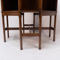 Ambrose Heals attri. An Arts & Crafts oak octagonal book table with eight legs - Thumbnail 15