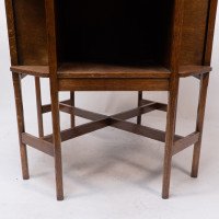 Ambrose Heals attri. An Arts & Crafts oak octagonal book table with eight legs - Thumbnail 16