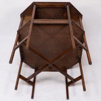 Ambrose Heals attri. An Arts & Crafts oak octagonal book table with eight legs - Thumbnail 18