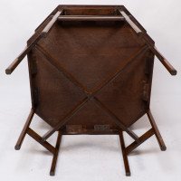 Ambrose Heals attri. An Arts & Crafts oak octagonal book table with eight legs - Thumbnail 17