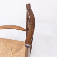 C R Ashbee attr. An Arts & Crafts oak ladder back armchair with re-rushed seat - Thumbnail 17