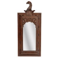 A Gothic Revival Oak Mirror Surmounted with a Carved Eagle to the Top