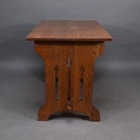 Liberty & Co., attributed. A Small Arts & Crafts Oak Dining Table - Thumbnail 3