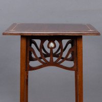 Liberty & Co., attributed. An Arts & Crafts Mahogany Occasional Table with Mother-Of-Pearl Inlays - Thumbnail 9