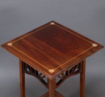 Liberty & Co., attributed. An Arts & Crafts Mahogany Occasional Table with Mother-Of-Pearl Inlays - Thumbnail 14