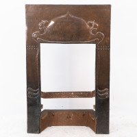 An Arts & Crafts Copper Fire Insert with Hand-crafted Stylized Floral Decoration