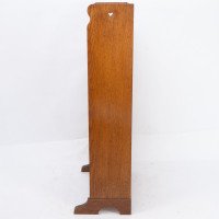 Liberty & Co., attributed. An Arts & Crafts Oak Bookcase with Stylized Heart Cut-outs - Thumbnail 4