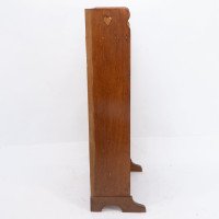 Liberty & Co., attributed. An Arts & Crafts Oak Bookcase with Stylized Heart Cut-outs - Thumbnail 5