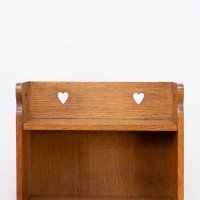 Liberty & Co., attributed. An Arts & Crafts Oak Bookcase with Stylized Heart Cut-outs - Thumbnail 7