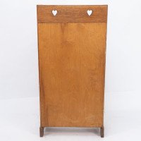 Liberty & Co., attributed. An Arts & Crafts Oak Bookcase with Stylized Heart Cut-outs - Thumbnail 13