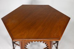 Liberty & Co. An Arts & Crafts walnut centre table with arched aprons - Thumbnail 6