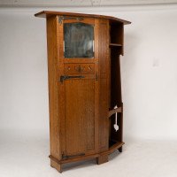 Shapland & Petter, attributed. An Arts & Crafts Oak Hall Cupboard with Flaring Cornice - Thumbnail 2
