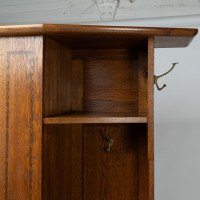 Shapland & Petter, attributed. An Arts & Crafts Oak Hall Cupboard with Flaring Cornice - Thumbnail 7