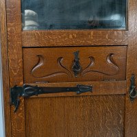 Shapland & Petter, attributed. An Arts & Crafts Oak Hall Cupboard with Flaring Cornice - Thumbnail 10