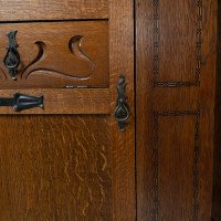 Shapland & Petter, attributed. An Arts & Crafts Oak Hall Cupboard with Flaring Cornice - Thumbnail 12