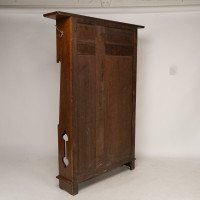 Shapland & Petter, attributed. An Arts & Crafts Oak Hall Cupboard with Flaring Cornice - Thumbnail 18