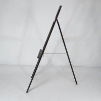 An Arts & Crafts folding oak easel with a carved butterfly flying from a flower - Thumbnail 4
