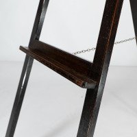 An Arts & Crafts folding oak easel with a carved butterfly flying from a flower - Thumbnail 14