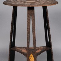 Liberty & Co., An Intricately Carved Arts & Crafts side table - Thumbnail 11