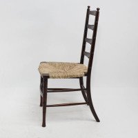 Liberty & Co., An English Aesthetic Movement Walnut Ladder Back Rush Seat Chair - Thumbnail 4