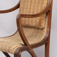 Louis Majorelle. An Art Nouveau Armchair in Carved Walnut Retaining the Original Period Fabric - Thumbnail 12