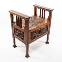 A. W. Simpson, attributed. Arts & Crafts Oak Piano Stool with Carved Floral Decoration - Thumbnail 1