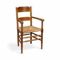 Frank Brangwyn Style Of. An Arts & Crafts Bobbin Turned Cotswold Style Oak Armchair