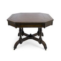 Maple & Co., A Gothic Revival Oak Leather Top Writing Table on Decorative Castors - Thumbnail 3