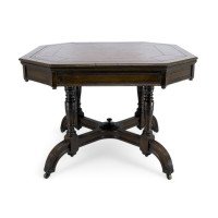 Maple & Co., A Gothic Revival Oak Leather Top Writing Table on Decorative Castors - Thumbnail 5