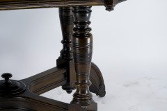 Maple & Co., A Gothic Revival Oak Leather Top Writing Table on Decorative Castors - Thumbnail 6