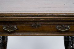 Maple & Co., A Gothic Revival Oak Leather Top Writing Table on Decorative Castors - Thumbnail 11