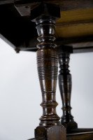Maple & Co., A Gothic Revival Oak Leather Top Writing Table on Decorative Castors - Thumbnail 17