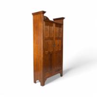 Shapland & Petter. An Arts & Crafts Oak Hall Cupboard with a Ruskin Circular Jewel - Thumbnail 2