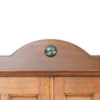Shapland & Petter. An Arts & Crafts Oak Hall Cupboard with a Ruskin Circular Jewel - Thumbnail 10