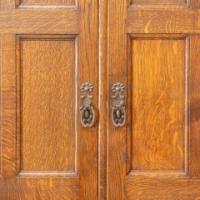 Shapland & Petter. An Arts & Crafts Oak Hall Cupboard with a Ruskin Circular Jewel - Thumbnail 12