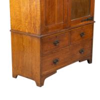 Liberty & Co., attributed. Arts & Crafts Oak Double Wardrobe with Stylized Cut-Outs - Thumbnail 11