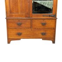 Liberty & Co., attributed. Arts & Crafts Oak Double Wardrobe with Stylized Cut-Outs - Thumbnail 13