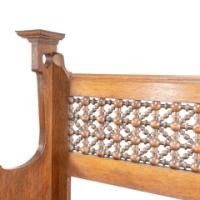 Liberty & Co., An Arts & Crafts Oak Settle with Mashrabiya Turnings to the Back - Thumbnail 8