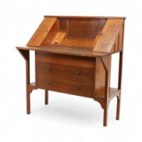 G. M. Ellwood for J. S. Henry. An Arts & Crafts Oak Writing Desk